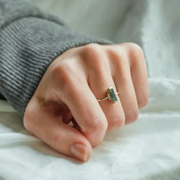 BRONTE engagement ring with baguette moss agate and diamonds worn on the hand