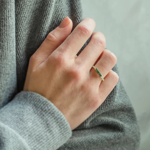 MILA engagement ring with baguette moss agate and diamonds worn on the hand