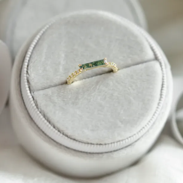 MILA engagement ring viewed from above, showing the baguette moss agate and diamonds