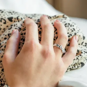 NALANI organic wedding ring worn on the hand, close-up