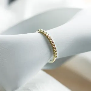 Angled view of the CHRISTINE gold diamond ring