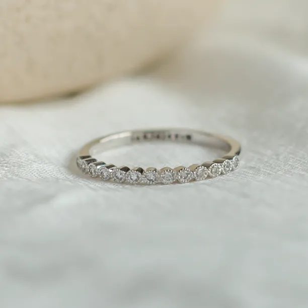 CHRISTINE gold ring with diamonds shown in a clear angled view