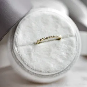 Close-up of the CHRISTINE gold ring with diamonds in half eternity design