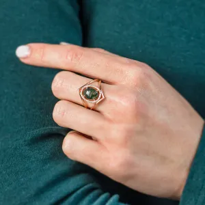 PINIA gold ring with moss agate and diamonds worn on a finger