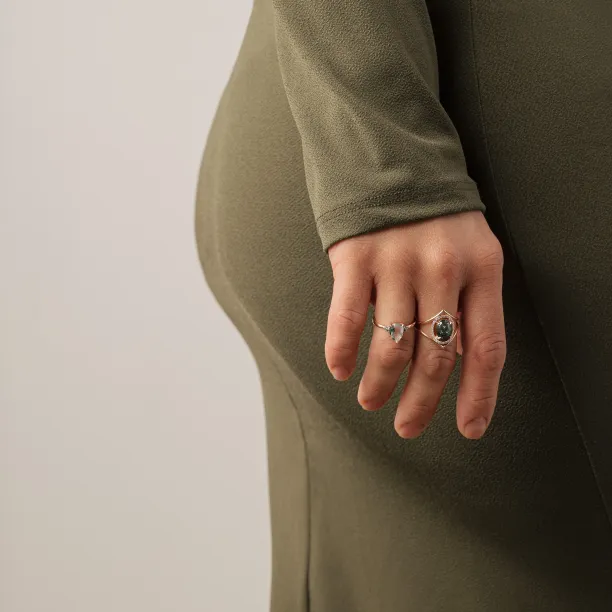 PINIA gold ring with moss agate and diamonds worn on the hand