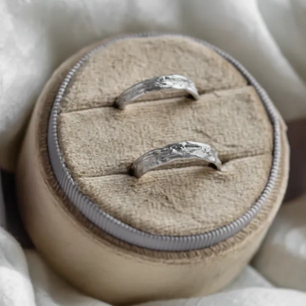 Unusual wedding rings with natural surface ARETA Image
