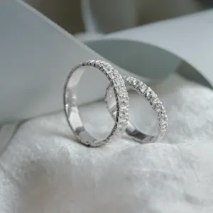 BECCA gold wedding rings showing their textured outer surfaces and smooth interiors