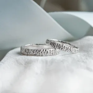 BECCA gold wedding rings with an unusual textured structure
