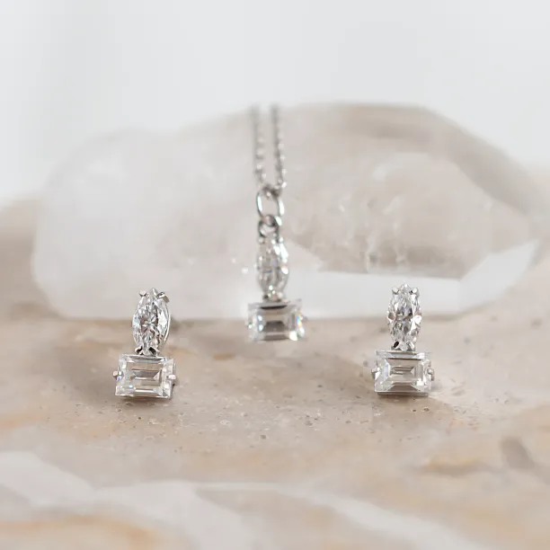 Close-up of the HOLLY jewelry set with marquise and baguette moissanites