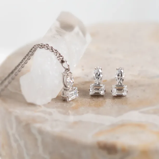 Angled view of the HOLLY necklace and earrings with moissanites