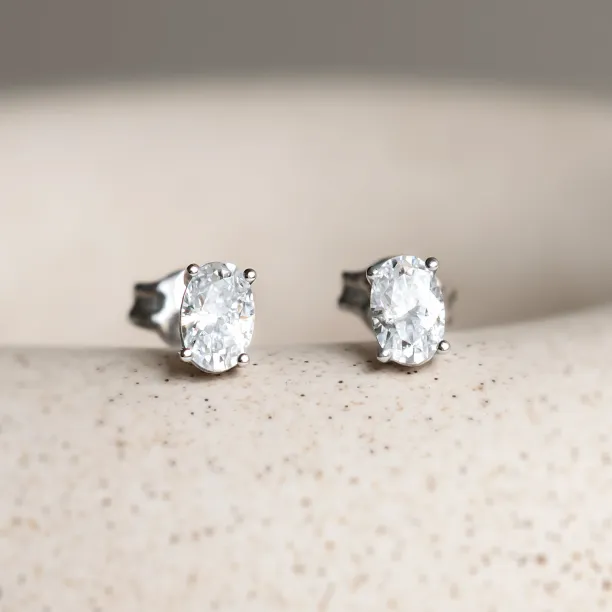 CAROLYNE gold minimalist earrings with oval moissanites