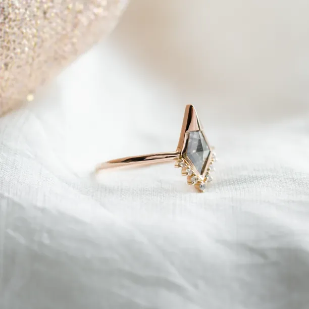ADIRA engagement ring with salt and pepper kite-shaped diamond and side diamonds, angled close-up