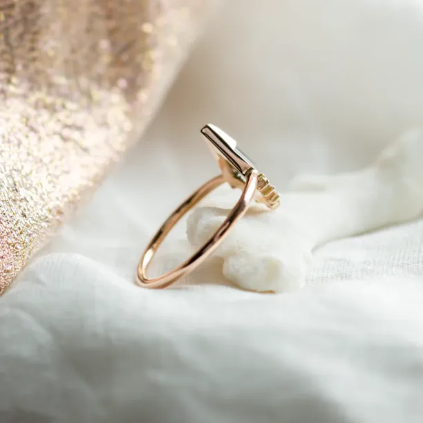 Side detail of ADIRA engagement ring with salt and pepper kite-shaped diamond