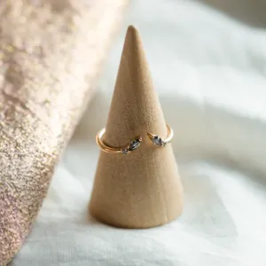 ADA open ring with salt and pepper diamonds displayed on a ring cone