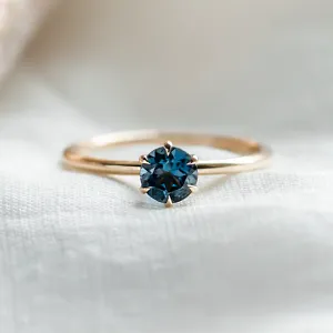 Engagement ring with london blue topaz MARGARET