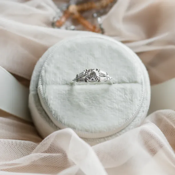 GINNY ring with round and baguette-shaped moissanites, front view