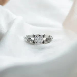 GINNY atypical ring with moissanites in a clear front view