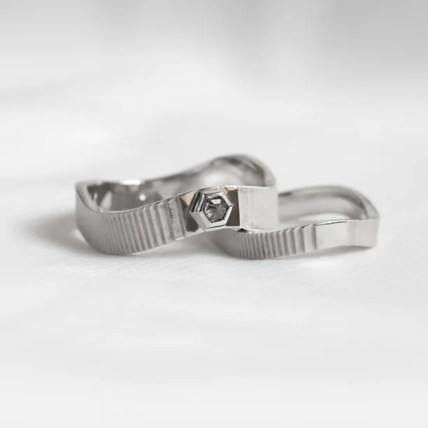 JACKLYN unusual wedding rings with salt and pepper diamond, shown as a pair