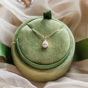 Gold necklace with pear moissanite NAOMI displayed with the full chain visible