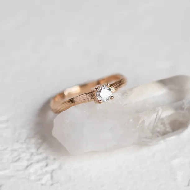 Atypical engagement ring with diamond and tree bark surface RIA Image