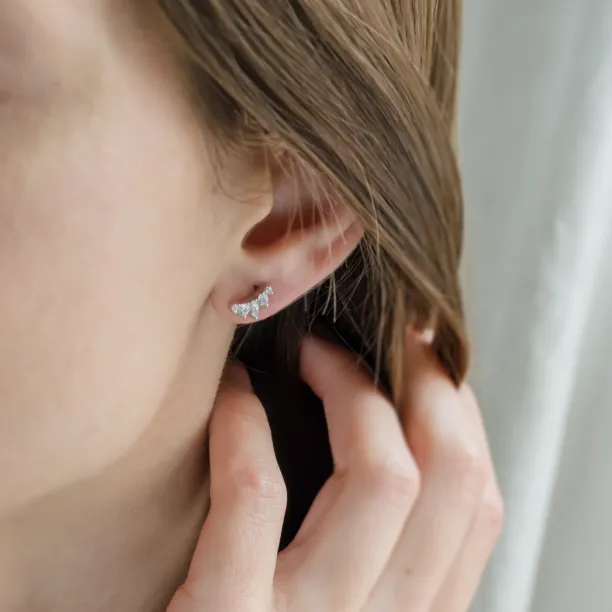 JESS gold crawler earring with moissanites worn on the ear
