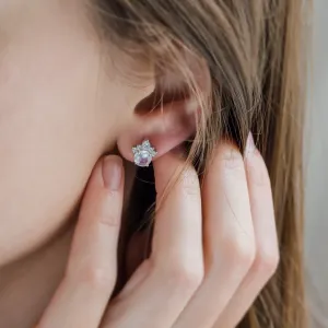 MONY gold earring with moonstone and diamonds worn on the ear