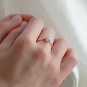 ISABELLA diamond engagement ring worn on a hand, angled view