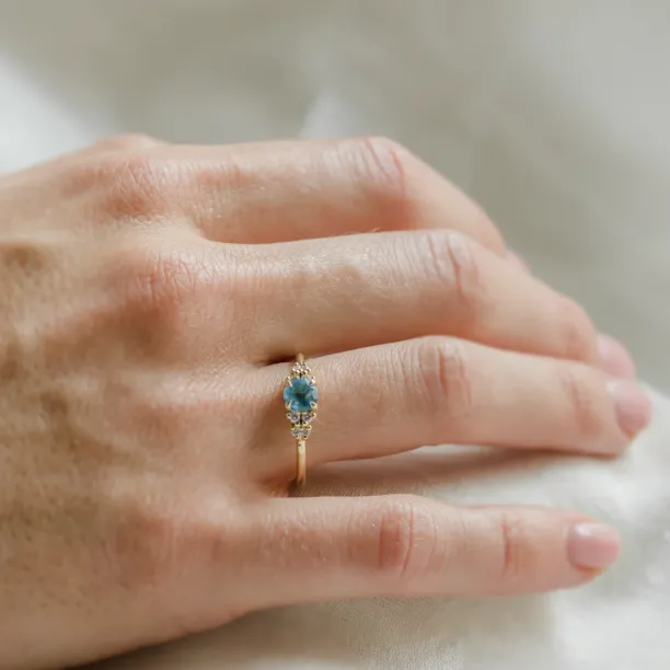 Gold ring with Swiss blue topaz and diamonds LUCIDE Image