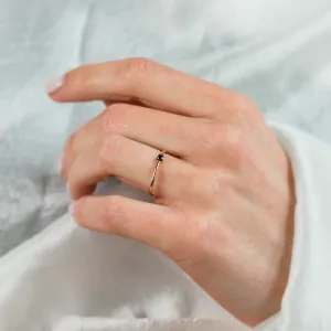 DUNCAN gold ring with a black diamond worn on the hand