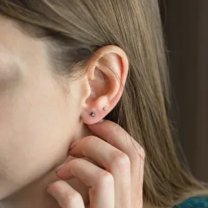 DUNCAN black diamond stud earring worn on an ear