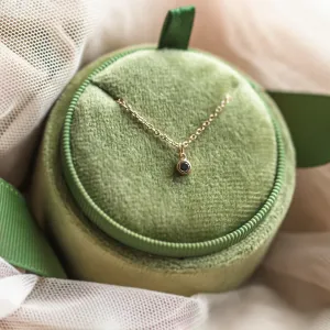 DARCY gold necklace with a black diamond pendant in close-up