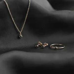 DARCY gold jewelry collection with black diamond necklace, earrings and ring