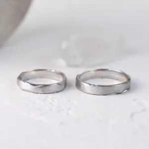 DANTE gold wedding bands displayed separately with irregular edges visible