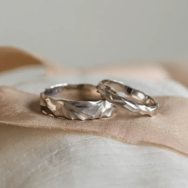 Pair of original engraved ROCK wedding rings in 14K white gold