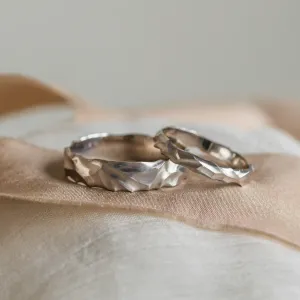Pair of original engraved ROCK wedding rings in 14K white gold