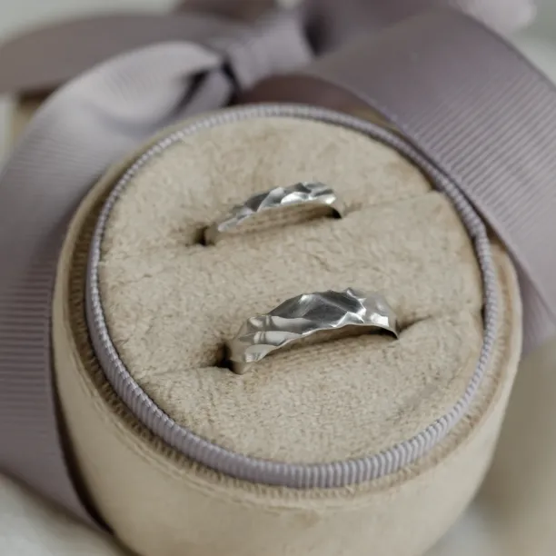 Pair of original engraved wedding rings ROCK with irregular hand-cut grooves