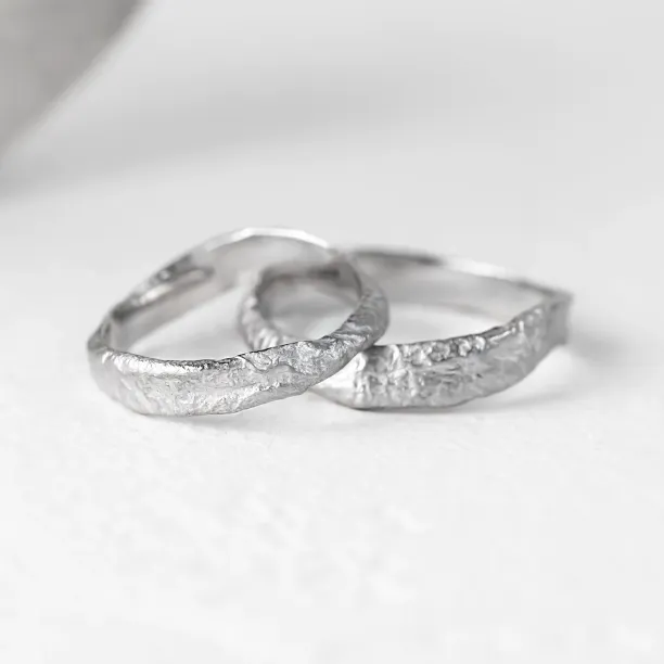 MUSK irregular gold wedding bands with moon-surface texture