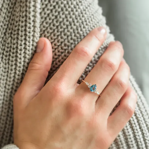 Gold ring with topaz and moissanites ASTROS Image