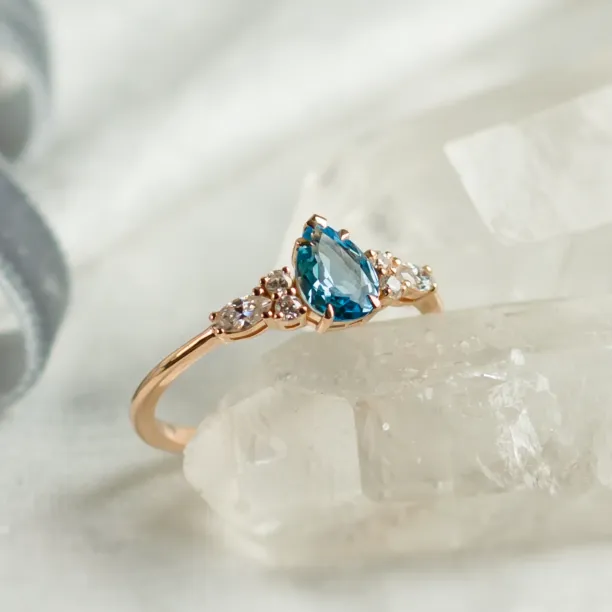 Gold ring with topaz and moissanites ASTROS Image