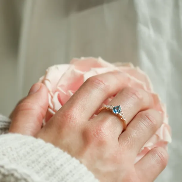 Gold ring with topaz and moissanites ASTROS Image