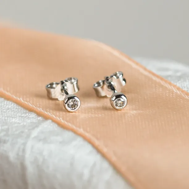 Pair of ANISE salt and pepper diamond earrings in 14K white gold