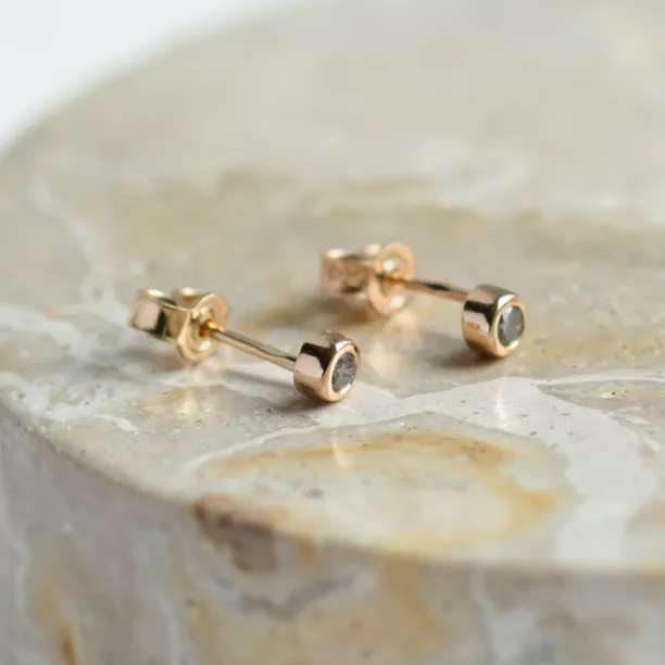 ANISE salt and pepper diamond earrings showing their posts and backs