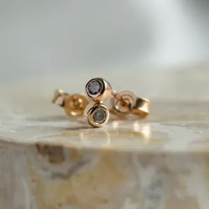 Close-up pair of ANISE salt and pepper diamond earrings