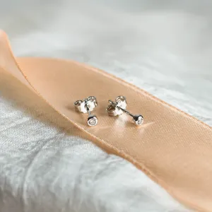 ANISE salt and pepper diamond earrings shown from an angled rear view