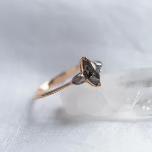 Close-up of RHEA vintage engagement ring with salt and pepper diamonds