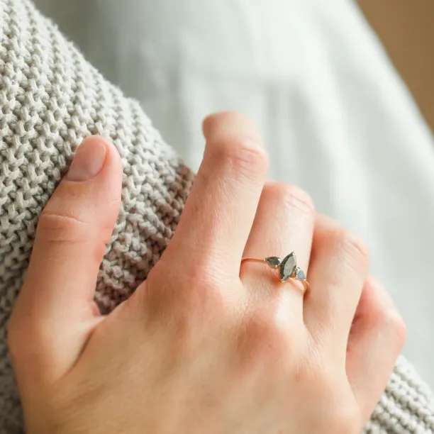 RHEA vintage engagement ring with salt and pepper diamonds worn on the hand