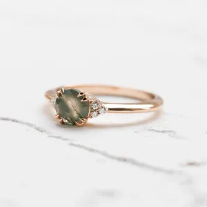 Side view of the moss agate and diamond engagement ring