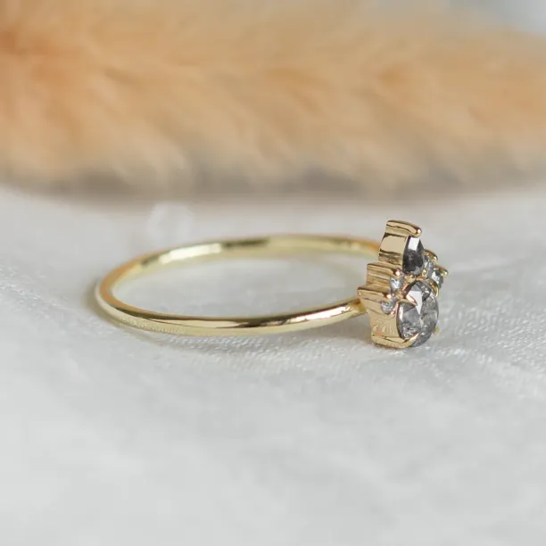 Angled view of the DAF ring showing its raised diamond setting