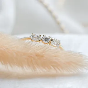 Close-up of the gold AVERY ring with three differently shaped moissanites