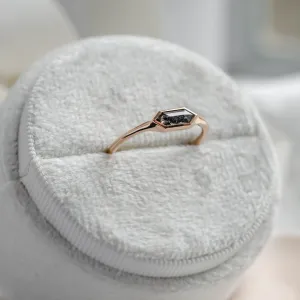 Angled view of the gold hexagon salt and pepper diamond ring